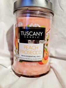 tuscany candle peach prosecco eith essential oils peach and tropical passionfruit