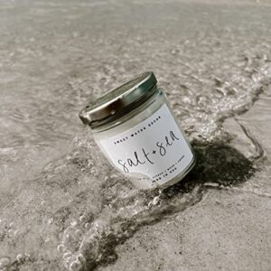 Sweet Water Decor Salt and Sea Candle | Sea Salt, Citrus, Amber, Musk, Beach Scented Soy Candles for Home | 9oz Clear Jar, 40 Hour Burn Time, Made in The USA