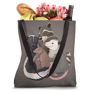 Group hug - Raccoon, Possum, Skunk, and Armadillo Tote Bag