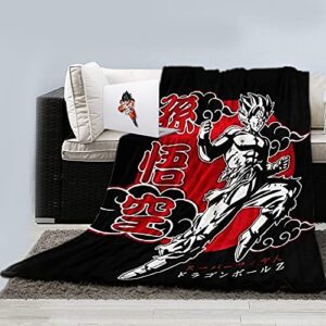stunned mind dragon ball z blanket with black/white and red accents, with magnet featuring goku using his kamehameha wave, 45” x 60”, shonen jump set