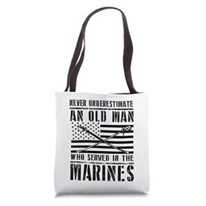 never underestimate an old man who served the marines corps tote bag