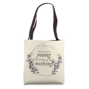when you are young they assume you know nothing tote bag