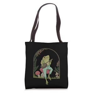 cottagecore aesthetic frog playing banjo on mushroom cute tote bag