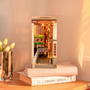 ROBOTIME DIY Book Nook Kit Decorative Bookend Insert Bookcase Book Stand Miniature House Kit with LED Light Creative Gift for Birthdays (Sakura Tram)