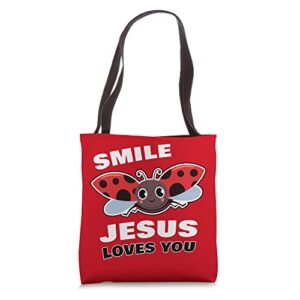 smile jesus loves you – adult & kids ladybug christian faith tote bag