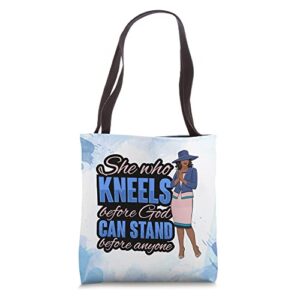 she who kneels before god can stand before anyone black girl tote bag