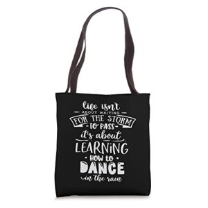 life is about how to dance in the rain god motivation faith tote bag