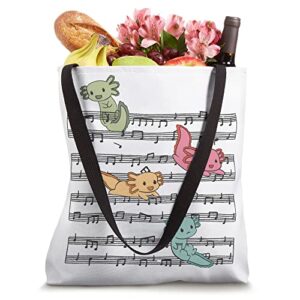 Cute Axolotl Plays With Music Notes On Music Sheet Tote Bag