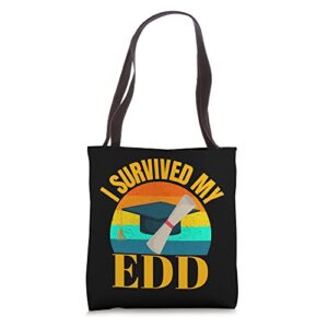 edd i survived my doctor of education doctorate graduation tote bag