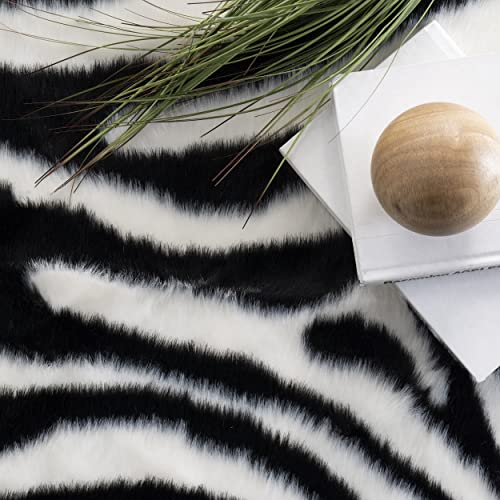 nuLOOM Jayla Machine Washable Zebra Faux Cowhide Area Rug, 5' 9" x 7' 7", Black and White