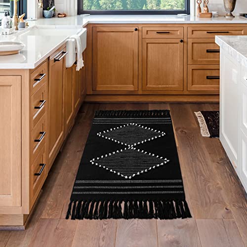 MitoVilla Black Boho Rug 2'x3', Black White Small Boho Bathroom Rug with Tassel, Farmhouse Geometric Bath Mat, Bohemian Runner Rug for Bedroom, Washable Cotton Woven Living Room Throw Rug