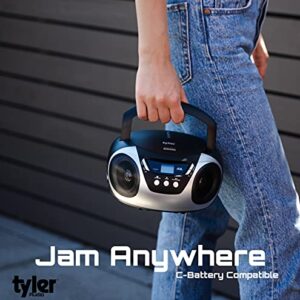 Tyler Portable CD Player Boombox Radio AM/FM Top Loading AC & Battery Compatible Aux Input & 3.5mm Headphone Jack Small Lightweight Compact Boom Box Home Stereo Speakers Carrying Handle Kids Silver