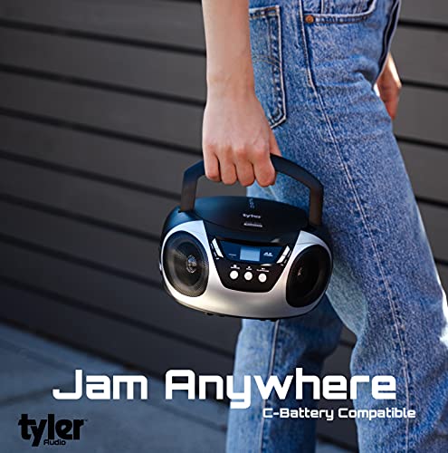 Tyler Portable CD Player Boombox Radio AM/FM Top Loading AC & Battery Compatible Aux Input & 3.5mm Headphone Jack Small Lightweight Compact Boom Box Home Stereo Speakers Carrying Handle Kids Silver