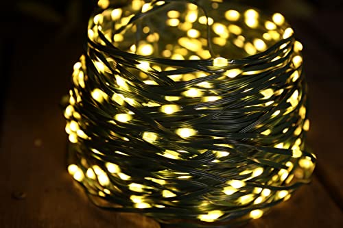 SUNILLUMA Outdoor Solar Fairy Lights - 300 LED 100FT Strong PVC Wire with 8 Functions by Remote, Waterproof, Warm White Lights and Green Wire, Great for Party, Garden and Holiday Decoration