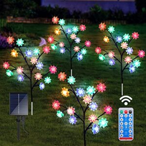 outdoor solar garden lights, 2022 upgraded 4 pack solar lights outdoor waterproof decorative flower lights with remote, 8 lighting modes solar powered garden lights for patio décor (multicolor)