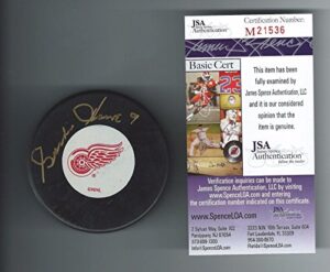 gordie howe signed detroit red wings puck jsa authenticated – autographed nhl pucks
