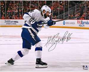 nikita kucherov tampa bay lightning autographed 16″ x 20″ white jersey shooting photograph – autographed nhl photos