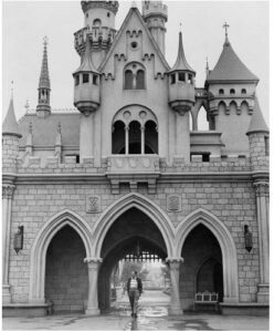 walt disney 11 inch x 14 inch photo in front of castle black & white