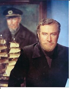 the ghost & mrs. muir edward mulhare as capt. daniel gregg standing in front of portrait 8×10 photo #2