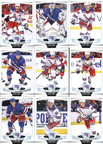 2019-20 O-Pee-Chee Hockey New York Rangers Team Set (Made by Upper Deck) of 15 Cards: Chris Kreider(#21), Henrik Lundqvist(#58), Neal Pionk(#67), Vladislav Namestnikov(#77), Marc Staal(#118), Ryan Strome(#140), Filip Chytil(#179), Lias Andersson(#197), Pa