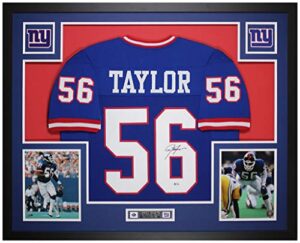 lawrence taylor autographed blue new york jersey – beautifully matted and framed – hand signed by taylor and certified authentic by beckett – includes certificate of authenticity