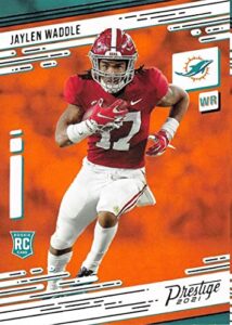 2021 panini prestige #213 jaylen waddle rc rookie card miami dolphins official nfl football trading card in raw (nm or better) condition