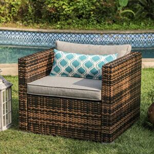 cosiest outdoor furniture all-weather mottlewood brown wicker single chair w warm gray thick cushions, teal pattern pillow
