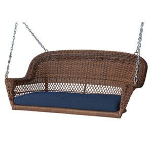 jeco honey resin wicker hanging porch swing with cushion in blue