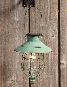 distressed porch lantern - solar-powered light with vintage-style cage - green