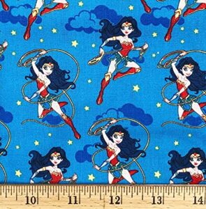 1 yard - wonder woman on blue cotton fabric (great for quilting, sewing, craft projects, quilt, throw pillows & more) 1 yard x 44