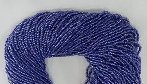 1 strands tanzanite hydro stabilized spacer seed beads - each strand is 10.5" long, beads measure 2-2.5mm long strand