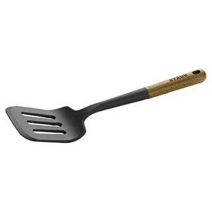 staub silicone spatula turner, perfectly angled for lifting pancakes, sandwiches and picking up veggies durable bpa-free matte black silicone, acacia wood handles, safe for nonstick cooking surfaces