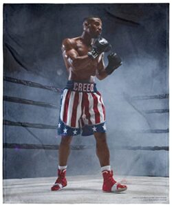 mgm adonis creed boxing champ super soft and cuddly plush fleece throw blanket