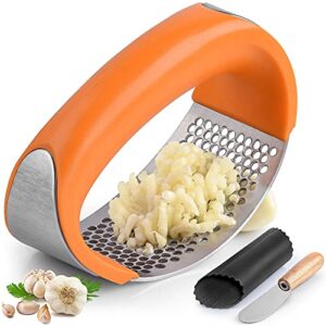 zulay stainless steel garlic press rocker set - premium garlic mincer with silicone peeler & scraper - arc shape design garlic crusher with comfortable grip (orange)