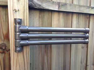 outdoor lamp company patio towel holder. 3 bar wall mount rack in bronze. made in the usa.