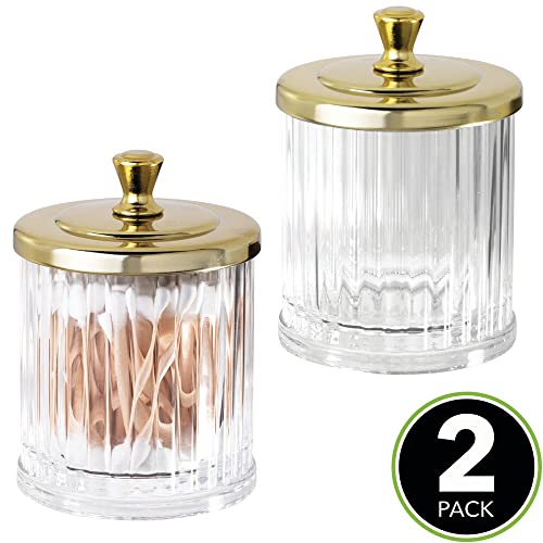 mDesign Fluted Bathroom Vanity Storage Organizer Canister Apothecary Jar for Cotton Swabs, Rounds, Balls, Makeup Sponges, Bath Salts - 2 Pack - Clear/Soft Brass