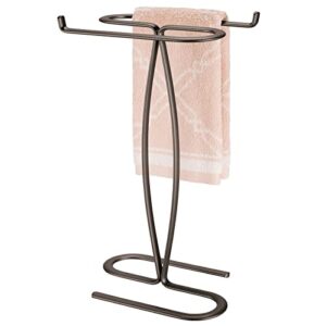 mdesign decorative modern metal fingertip, hand towel holder stand - for bathroom vanity countertops to display and store small guest towels - 2-sided, 14" high - bronze