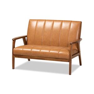 baxton studio nikko mid-century modern tan faux leather upholstered and walnut brown finished wood loveseat