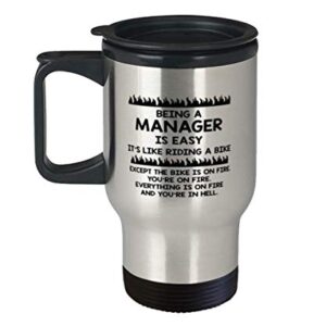 Manager Unique Tumbler Travel Coffee Mug Ideas for Birthday or Christmas. Being a Manager is easy, It's like riding a bike. Except the bike is on fire. You're on fire. Everything is on fire and