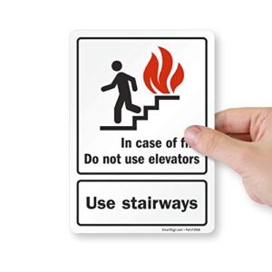 SmartSign (Pack of 4) 7 x 5 inch “in Case of Fire Do Not Use Elevators, Use Stairways” Sticker Labels with Symbol, 5 mil Laminated Polyester with SuperStick Adhesive, Red, Black and White