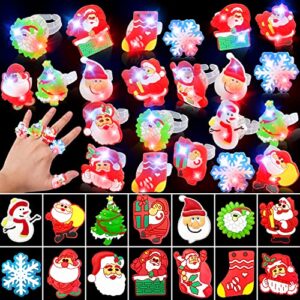 turnmeon 50 pack led light up ring christmas party favors stocking stuffers for kids flashing glow in the dark funny christmas party supplies toy gift boys girls christmas party favors decorations