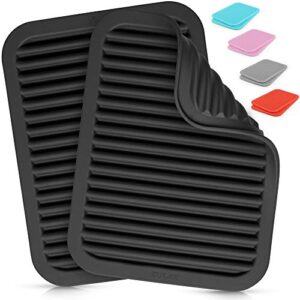 zulay 2 pack (9"x12") silicone trivets for hot pots and pans - multi-purpose & versatile trivet mat - heat resistant silicone trivet - durable & flexible hot pads for kitchen counter - black
