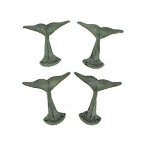 set of 4 verdigris green cast iron decorative whale tail wall hooks coastal decor 5 inches long