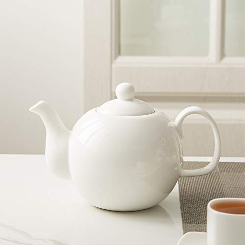 KitchenTour English Porcelain Tea pots -27oz for blooming&loose leaf, Fine Serving Ceramic Tea Pot with Upgraded Strainer Holes for Tea Party-White