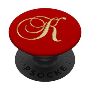 phone grip letter k tan yellow. initial k tan yellow on red popsockets grip and stand for phones and tablets
