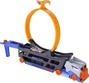 hot wheels stunt & go track set with 1 toy car, transforming hauler truck with launcher, stores 18 1:64 scale cars [amazon exclusive]