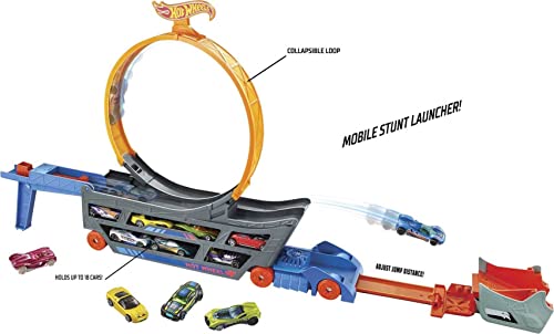 Hot Wheels Stunt & Go Track Set with 1 Toy Car, Transforming Hauler Truck with Launcher, Stores 18 1:64 Scale Cars [Amazon Exclusive]