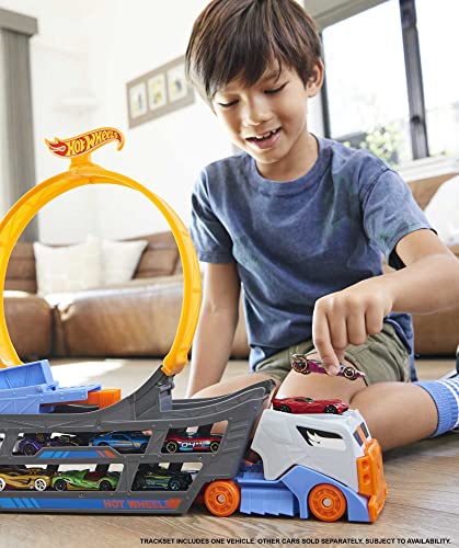 Hot Wheels Stunt & Go Track Set with 1 Toy Car, Transforming Hauler Truck with Launcher, Stores 18 1:64 Scale Cars [Amazon Exclusive]