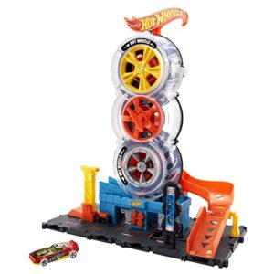 hot wheels toy car track set city super twist tire shop with 1:64 scale car, single or multi-car play