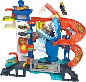 hot wheels city toy car track set attacking shark escape playset with 1:64 scale car, race to avoid chomping shark